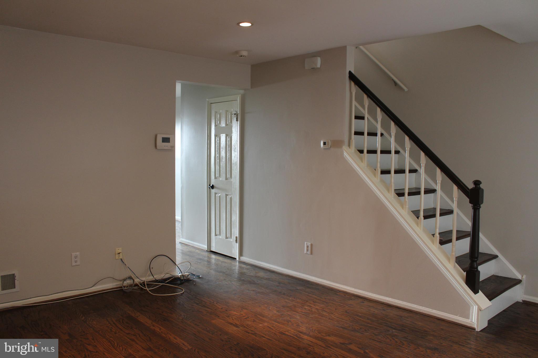 175 Leedom Way Newtown, PA 18940 - Photo 19 of 36 a view of a room with wooden floor and staircase