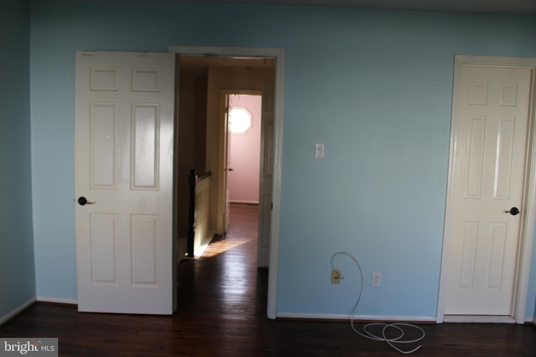 175 Leedom Way Newtown, PA 18940 - Photo 23 of 36 a view of a hallway with wooden floor