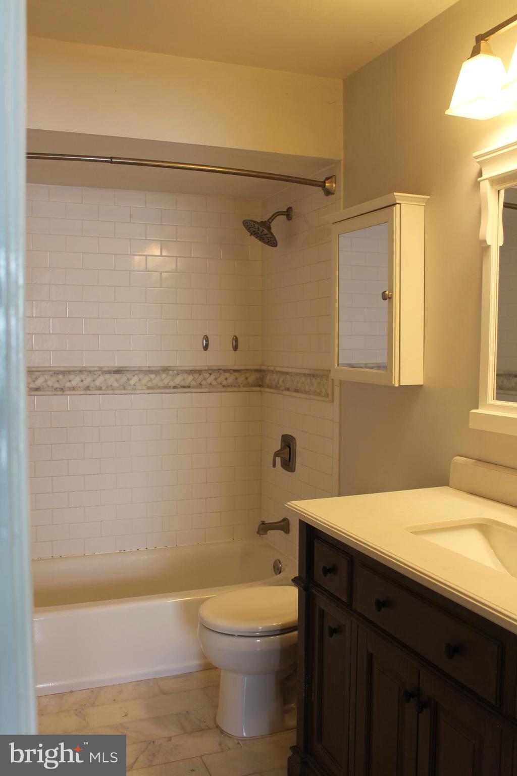 175 Leedom Way Newtown, PA 18940 - Photo 25 of 36 a bathroom with a sink a toilet and shower