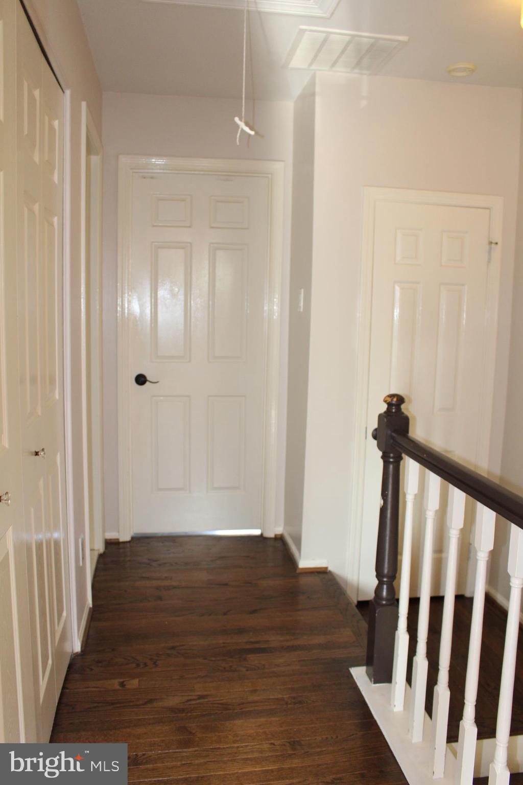 175 Leedom Way Newtown, PA 18940 - Photo 27 of 36 a view of a hallway with wooden floor