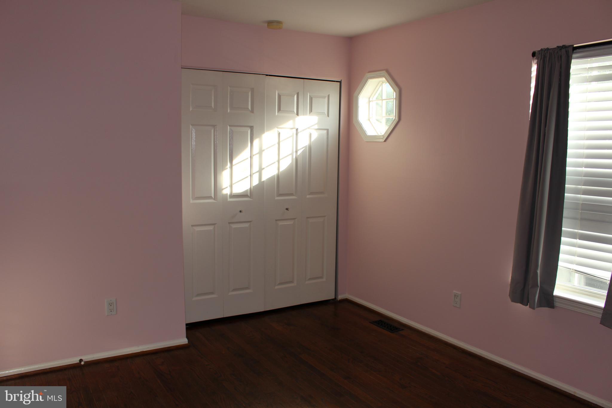 175 Leedom Way Newtown, PA 18940 - Photo 29 of 36 an empty room with wooden floor and windows