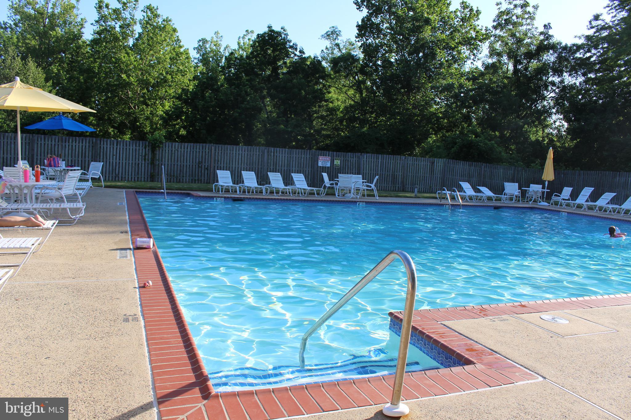 175 Leedom Way Newtown, PA 18940 - Photo 36 of 36 a view of a swimming pool with chairs