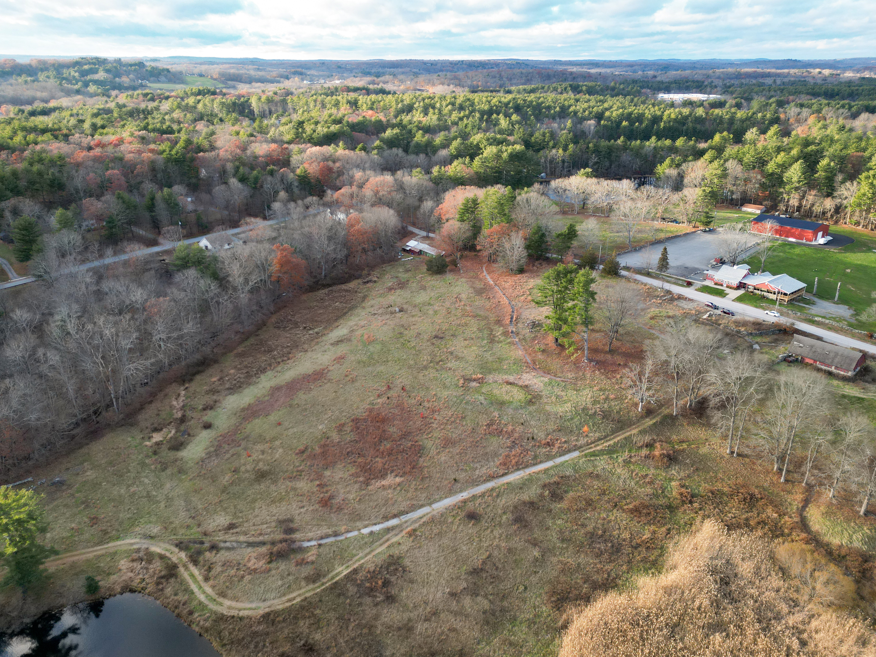 147 South Street Brooklyn, CT 06234 - Photo 3 of 13 a view of a pathway with a garden
