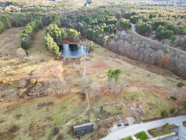a view of a pathway with a yard