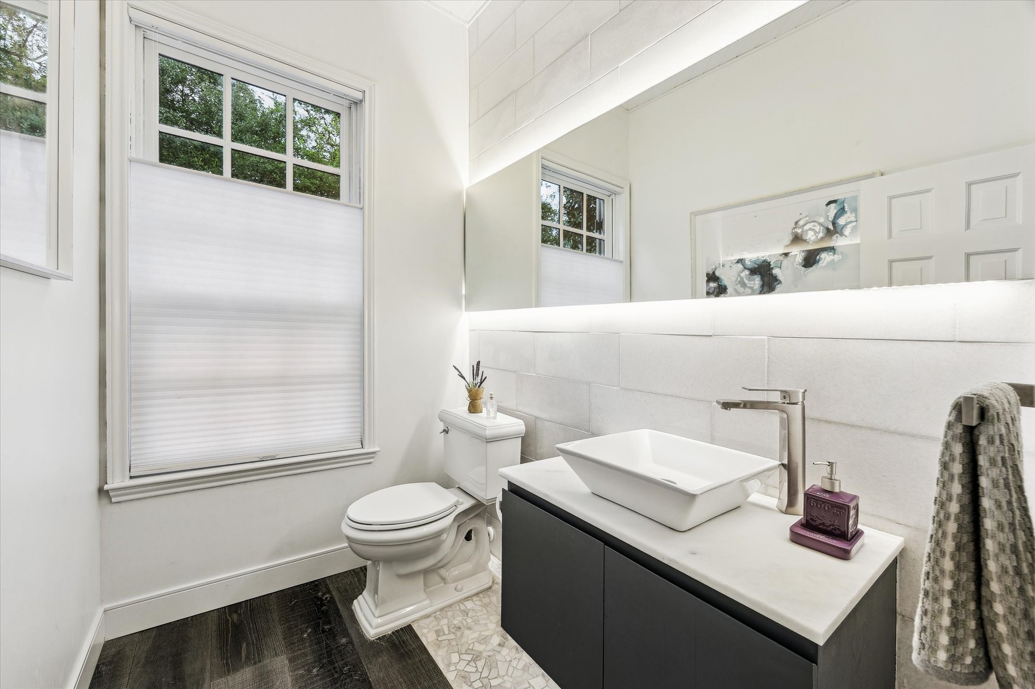 2114 Wroxton Road Houston, TX 77005 - Photo 14 of 48 a bathroom with a sink and a toilet