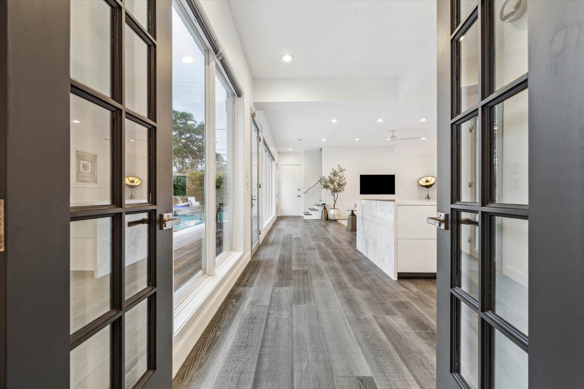 2114 Wroxton Road Houston, TX 77005 - Photo 16 of 48 a view of a living room with a large window