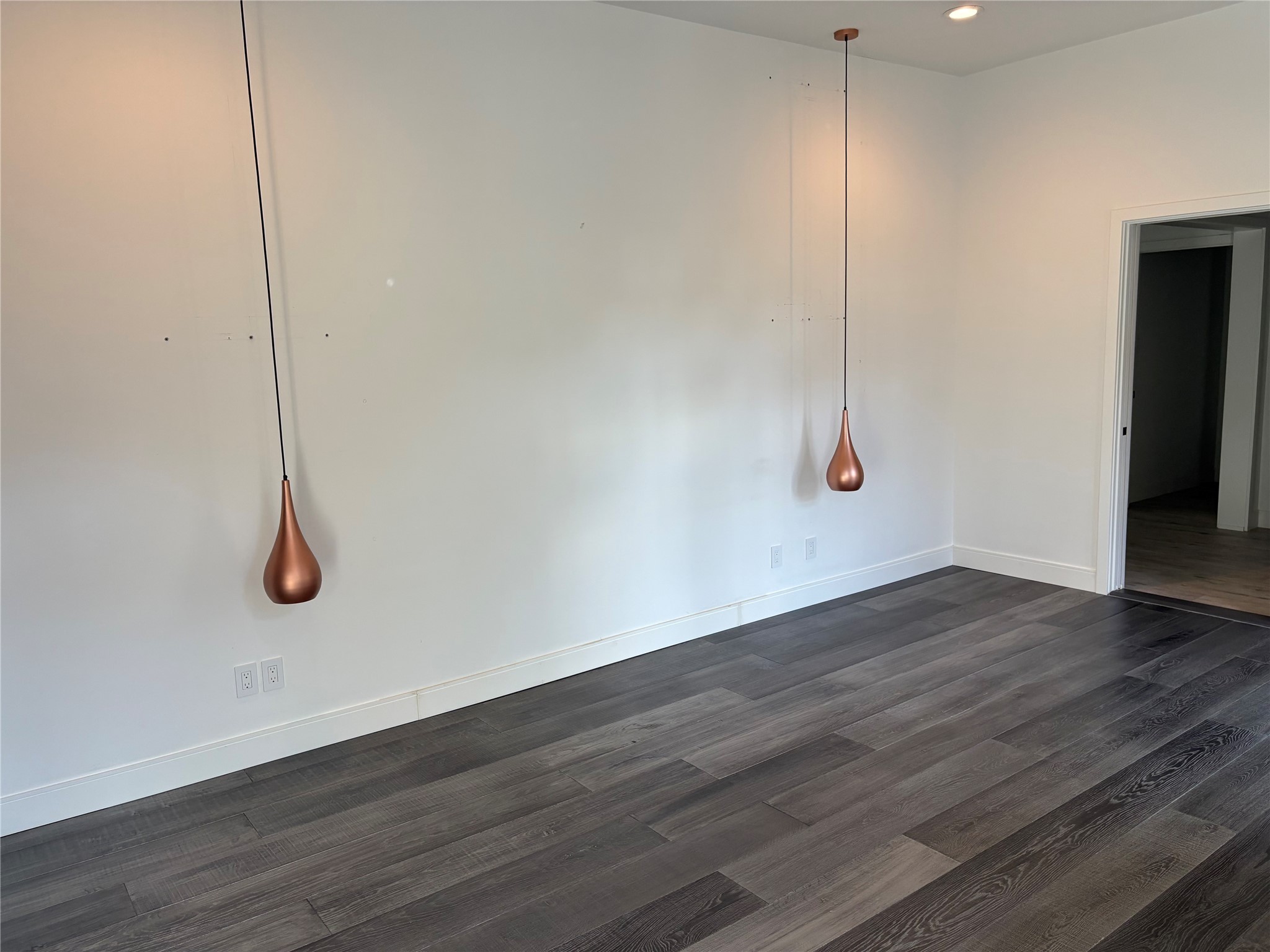 2114 Wroxton Road Houston, TX 77005 - Photo 24 of 48 a room with a bench and wooden floor