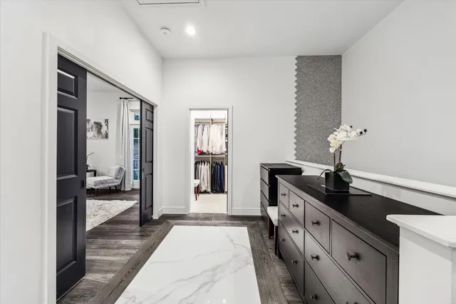 a kitchen with a sink and refrigerator