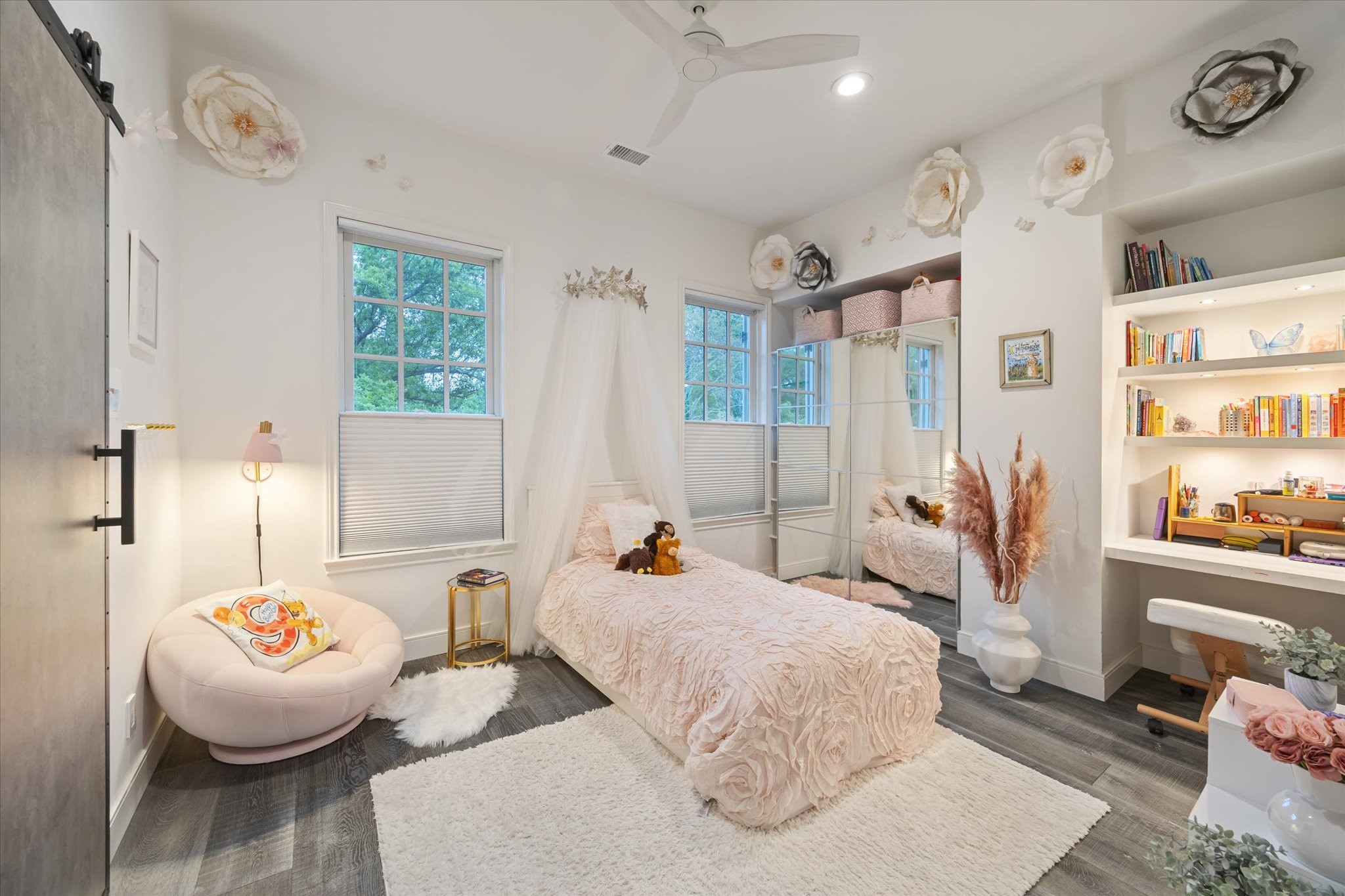 2114 Wroxton Road Houston, TX 77005 - Photo 36 of 48 a bedroom with furniture and a large window