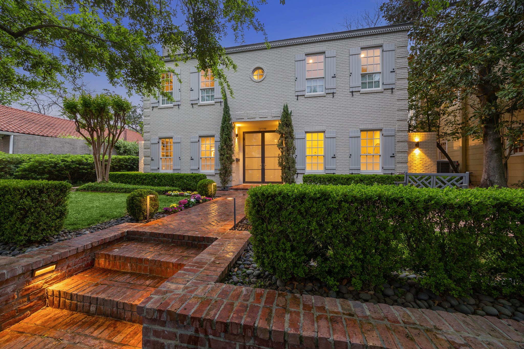 2114 Wroxton Road Houston, TX 77005 - Photo 41 of 48 a front view of a house with garden