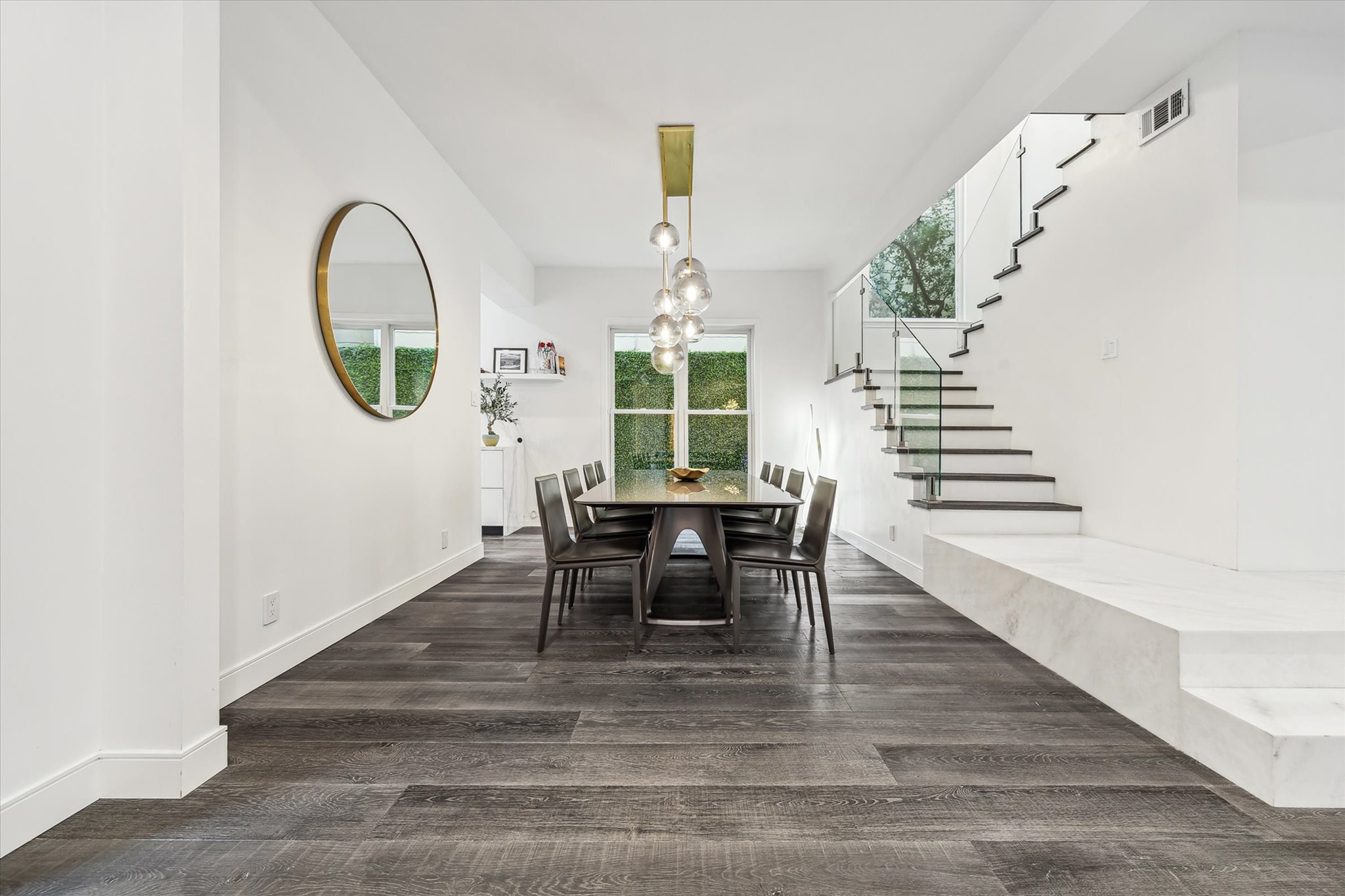 2114 Wroxton Road Houston, TX 77005 - Photo 9 of 48 a dining room with furniture entryway and wooden floor