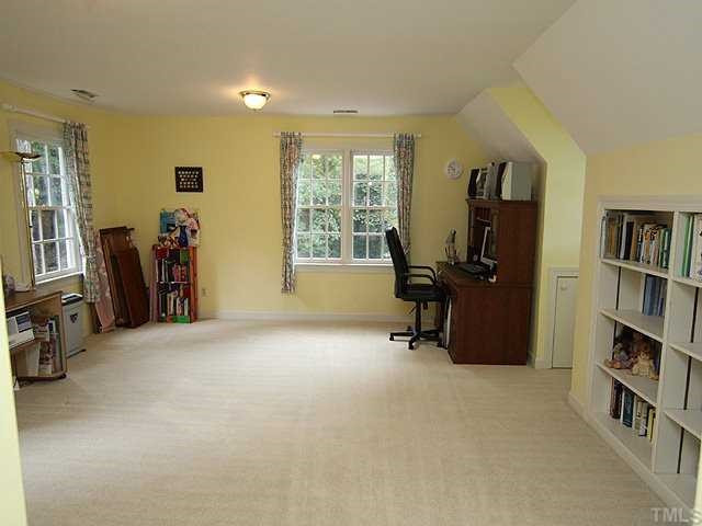 9000 Enfield Court Raleigh, NC 27615 - Photo 12 of 18 The second floor bonus room has closets and built-in shelving...work, play, relax-it is a great place to gather. Bonus Room