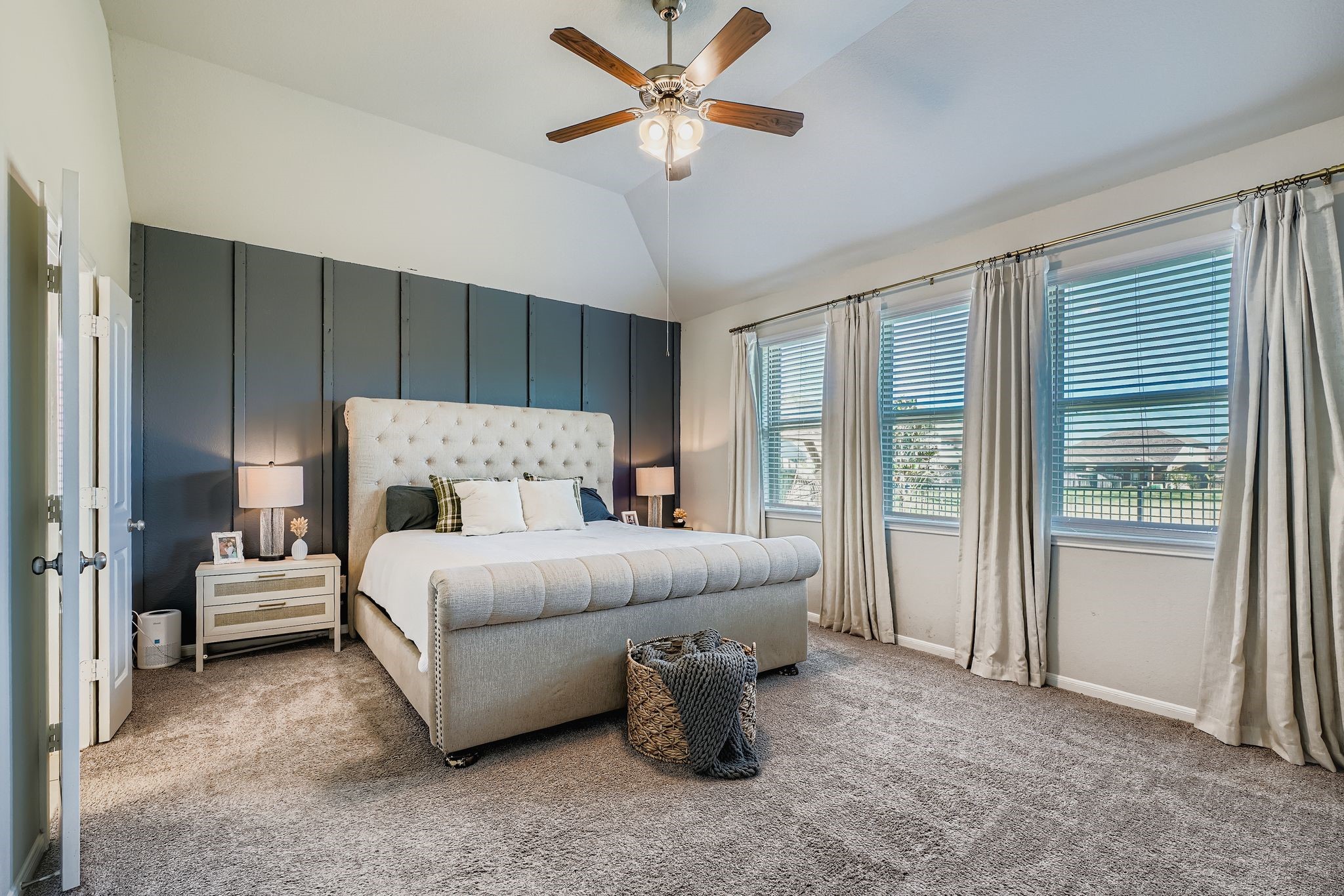 2614 Wembley Way Rosenberg, TX 77471 - Photo 14 of 24 a bedroom with bed and a chandelier