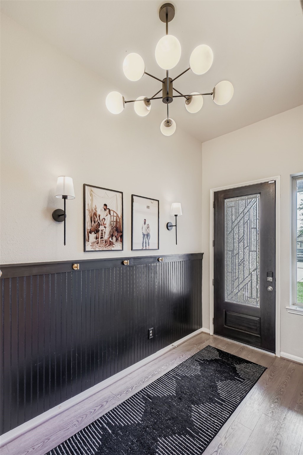 2614 Wembley Way Rosenberg, TX 77471 - Photo 6 of 24 wooden floor in an empty room with a window