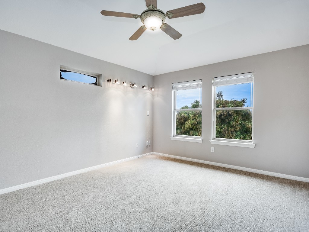 1014 Challenger Lakeway, TX 78734 - Photo 14 of 16 a view of an empty room with a window