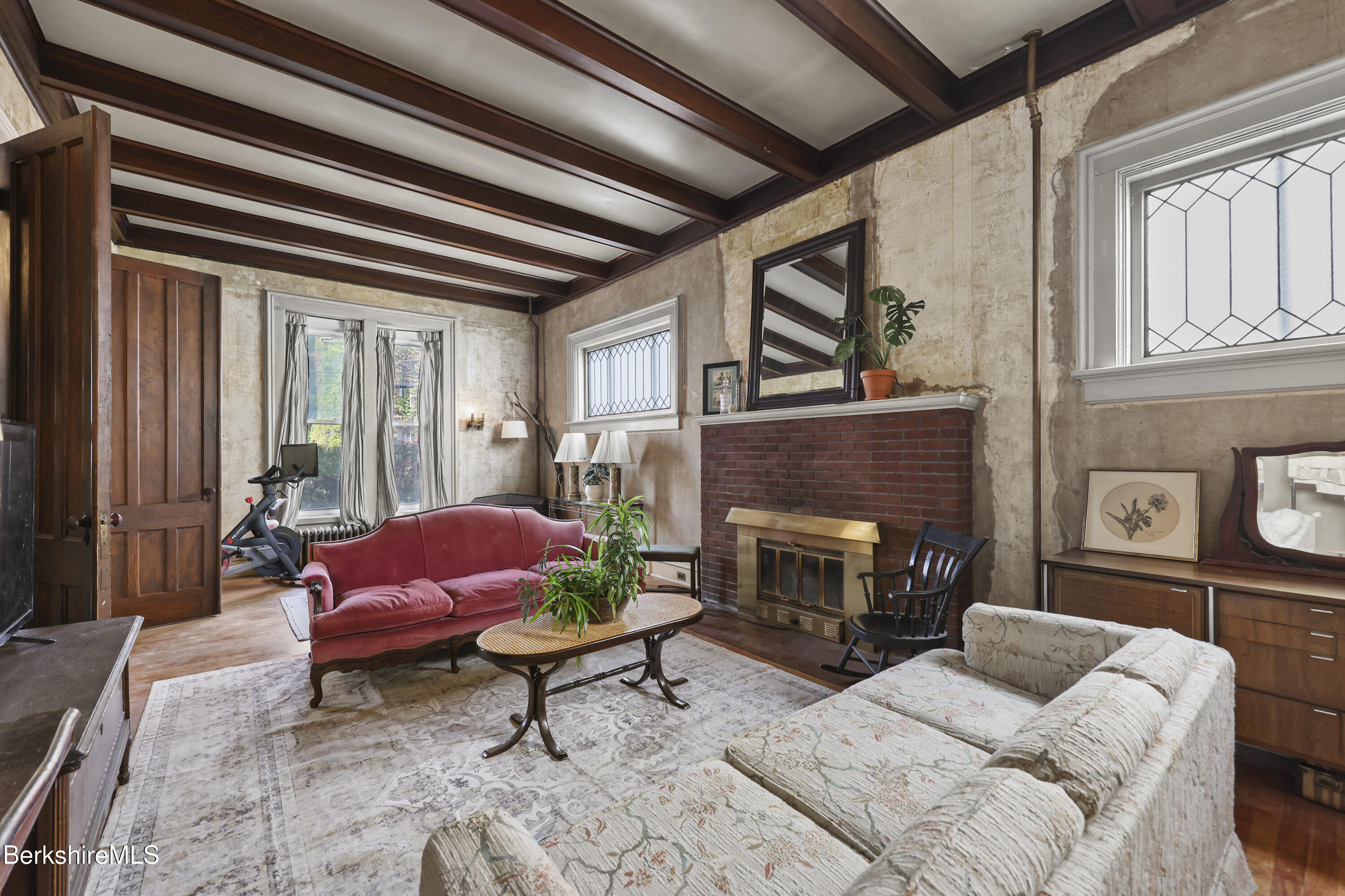 194 East Main Street North Adams, MA 01247 - Photo 11 of 50 a living room with furniture and a fireplace