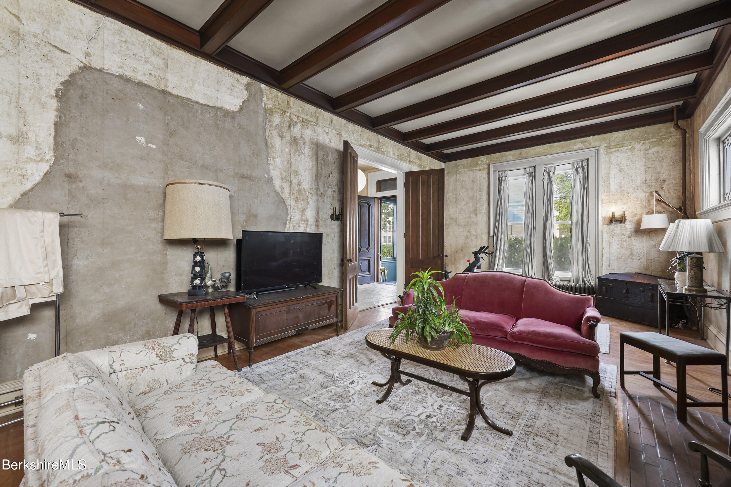 194 East Main Street North Adams, MA 01247 - Photo 12 of 50 a living room with furniture and a flat screen tv