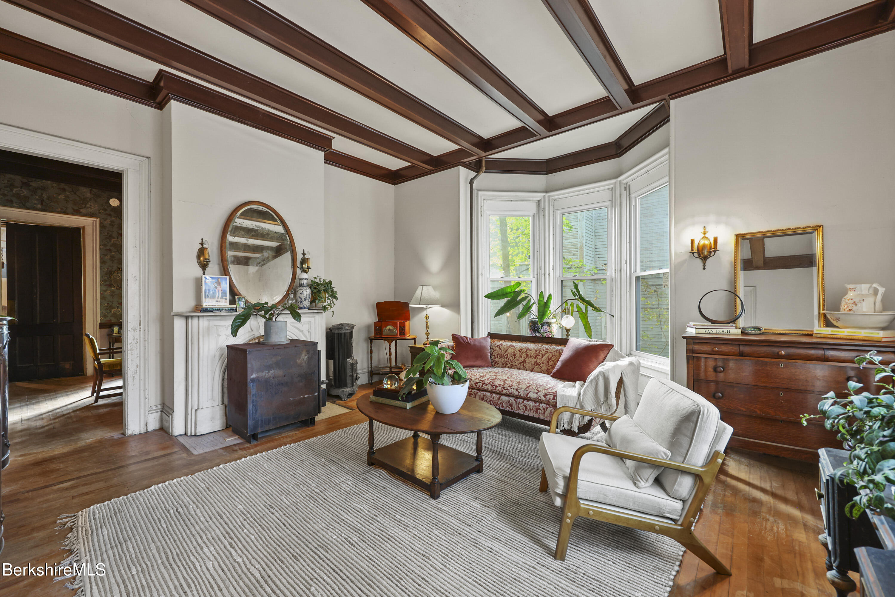 194 East Main Street North Adams, MA 01247 - Photo 13 of 50 a living room with furniture a fireplace and a large window
