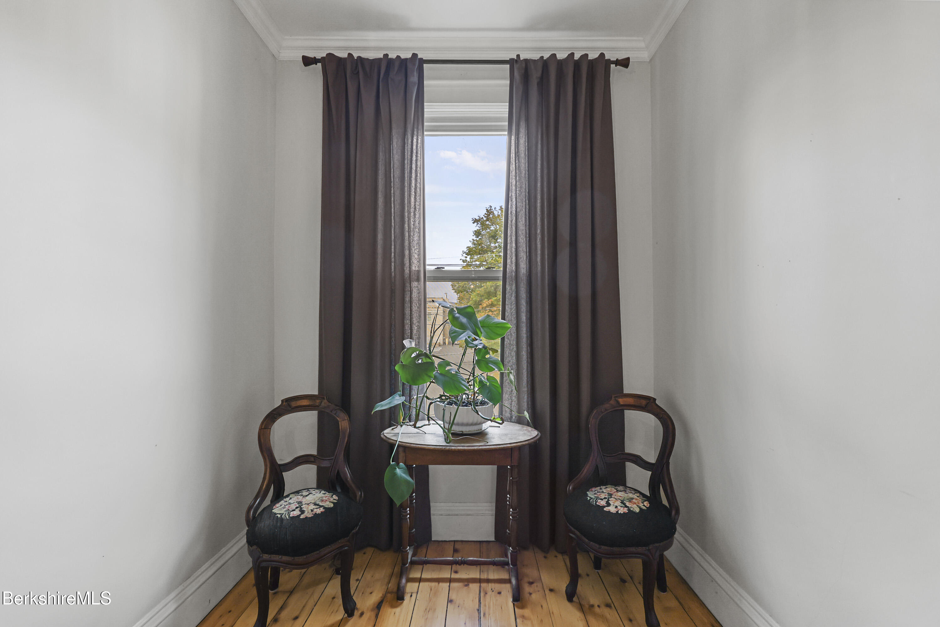 194 East Main Street North Adams, MA 01247 - Photo 23 of 50 a table and chairs in a gallery