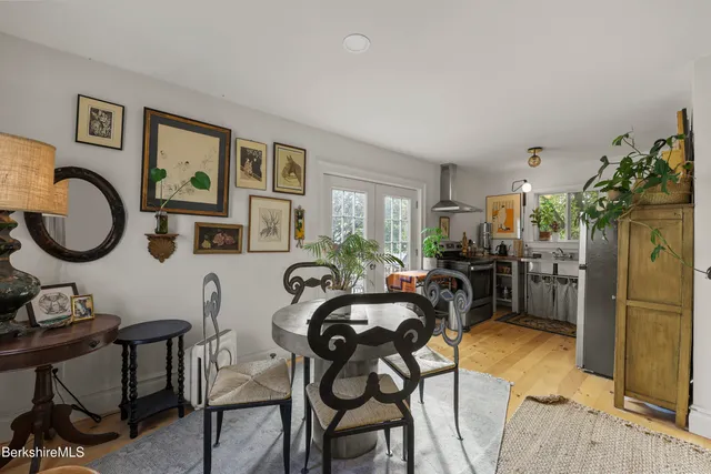 a view of a livingroom with furniture workspace and a window