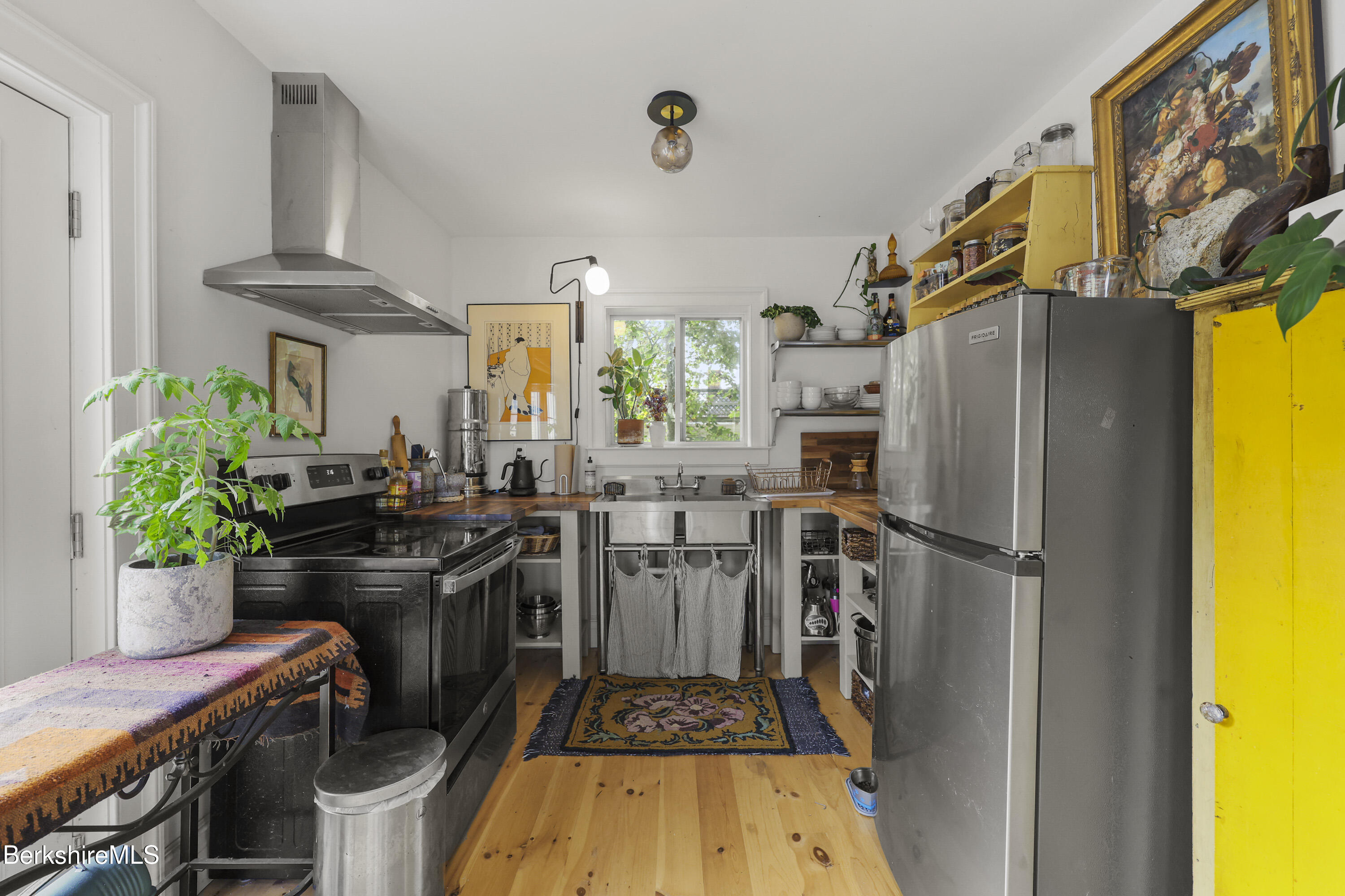 194 East Main Street North Adams, MA 01247 - Photo 38 of 50 a kitchen with a refrigerator and a stove