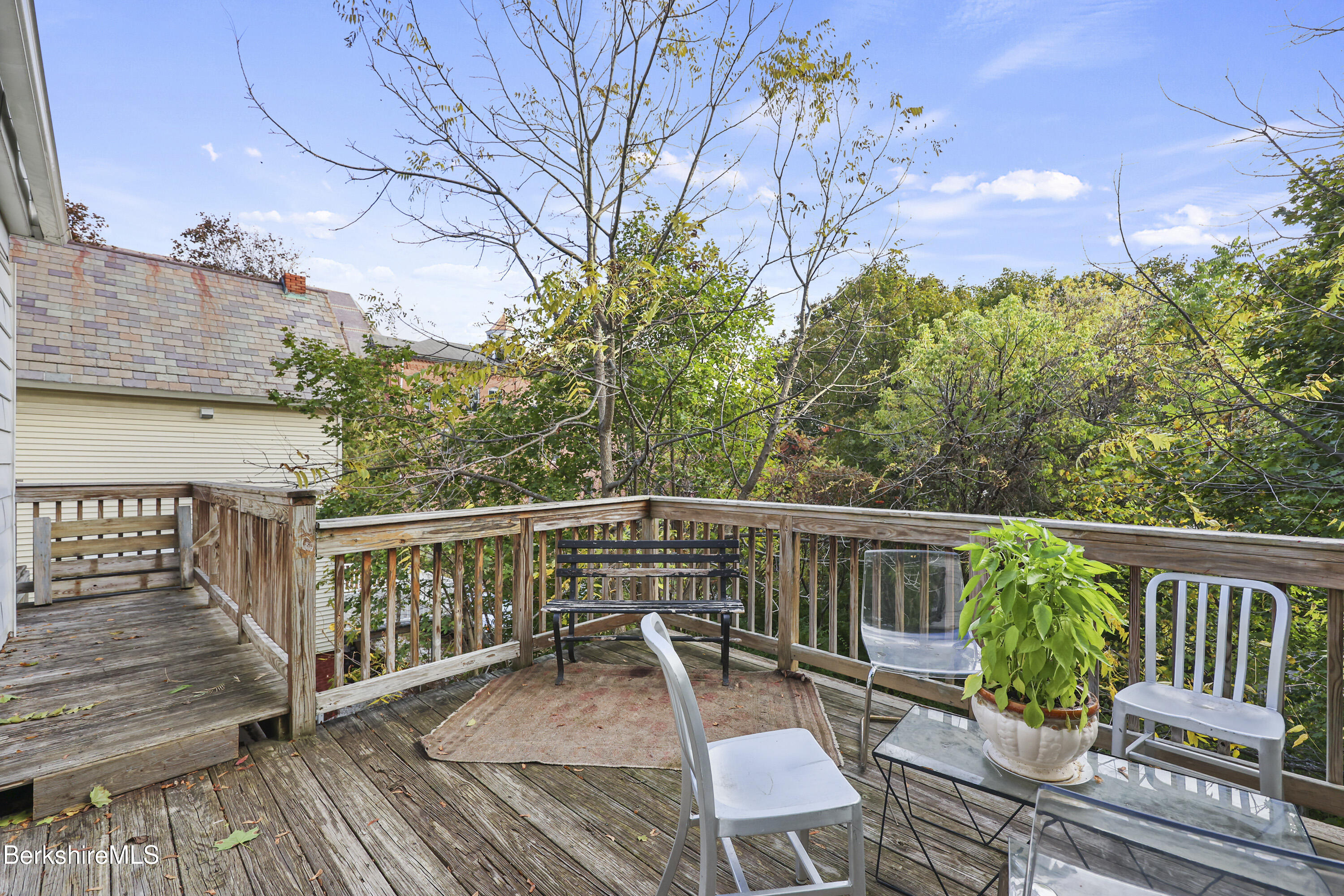 194 East Main Street North Adams, MA 01247 - Photo 42 of 50 a view of a chair and table on the wooden floor