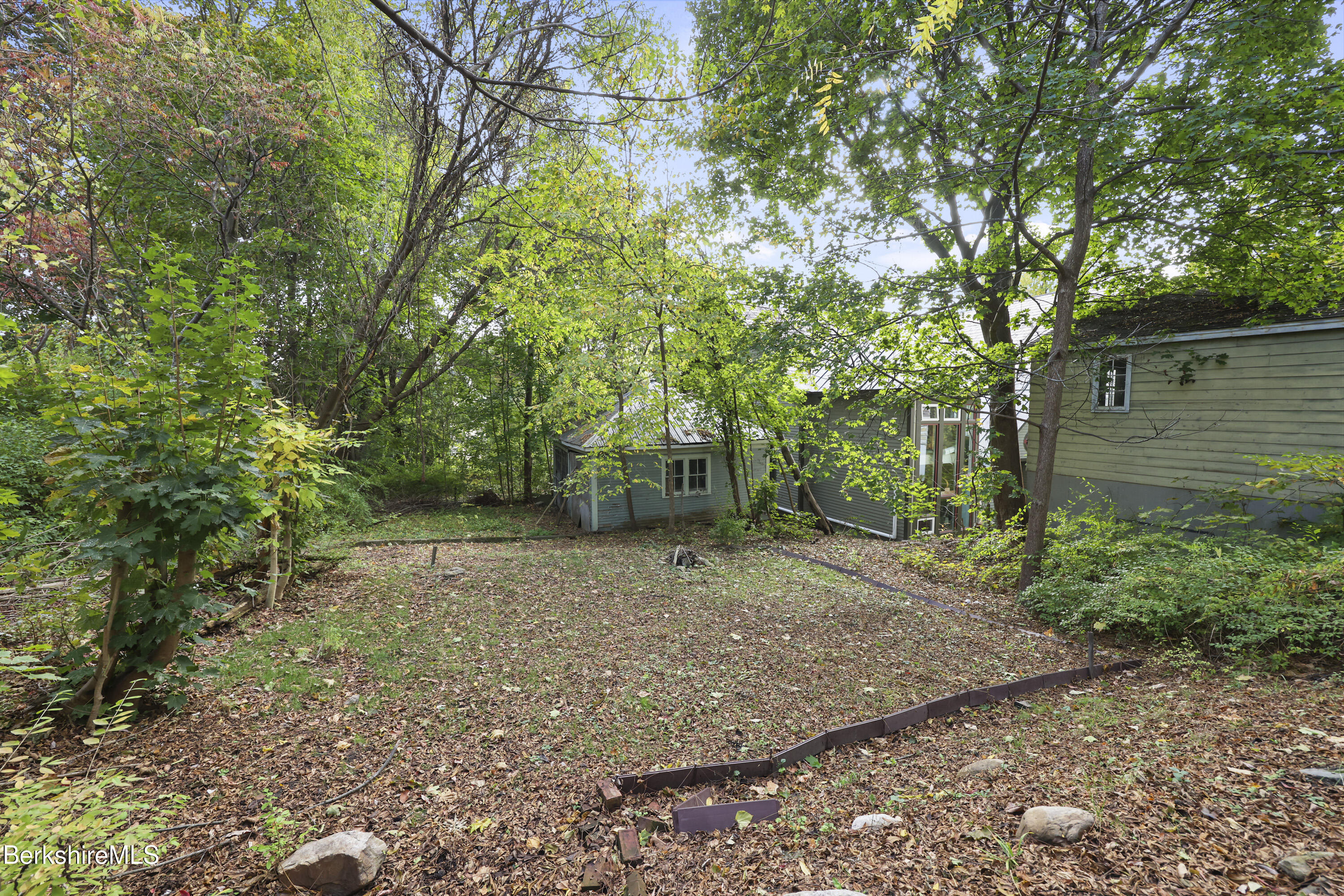 194 East Main Street North Adams, MA 01247 - Photo 46 of 50 a backyard of a house with lots of green space