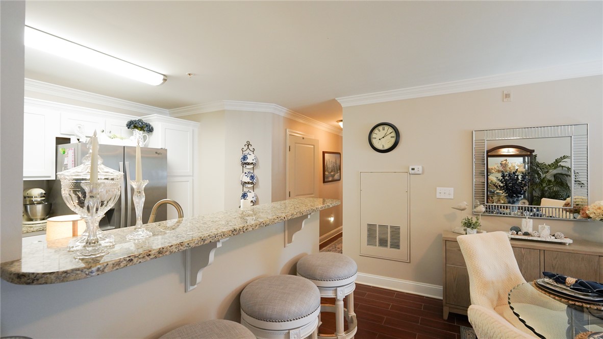 303 Lookover Drive Anderson, SC 29621 - Photo 7 of 46 This inviting kitchen seamlessly connects to the dining area, ideal for entertaining and daily living.