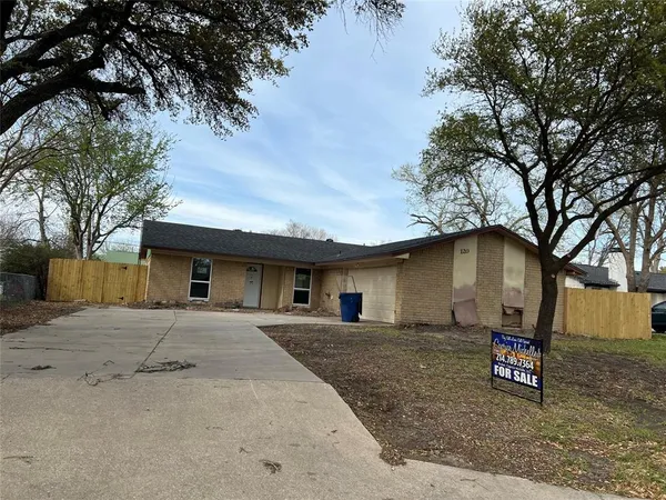 a house view with a backyard space