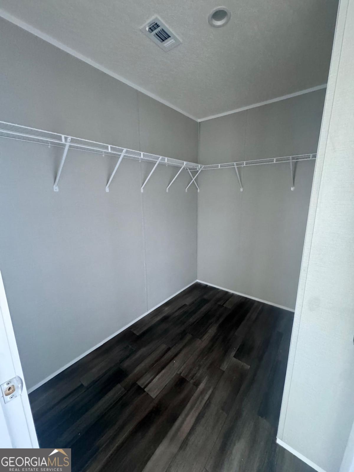 59 Long Leaf Road Hazlehurst, GA 31539 - Photo 14 of 19 a view of a room with wooden floor