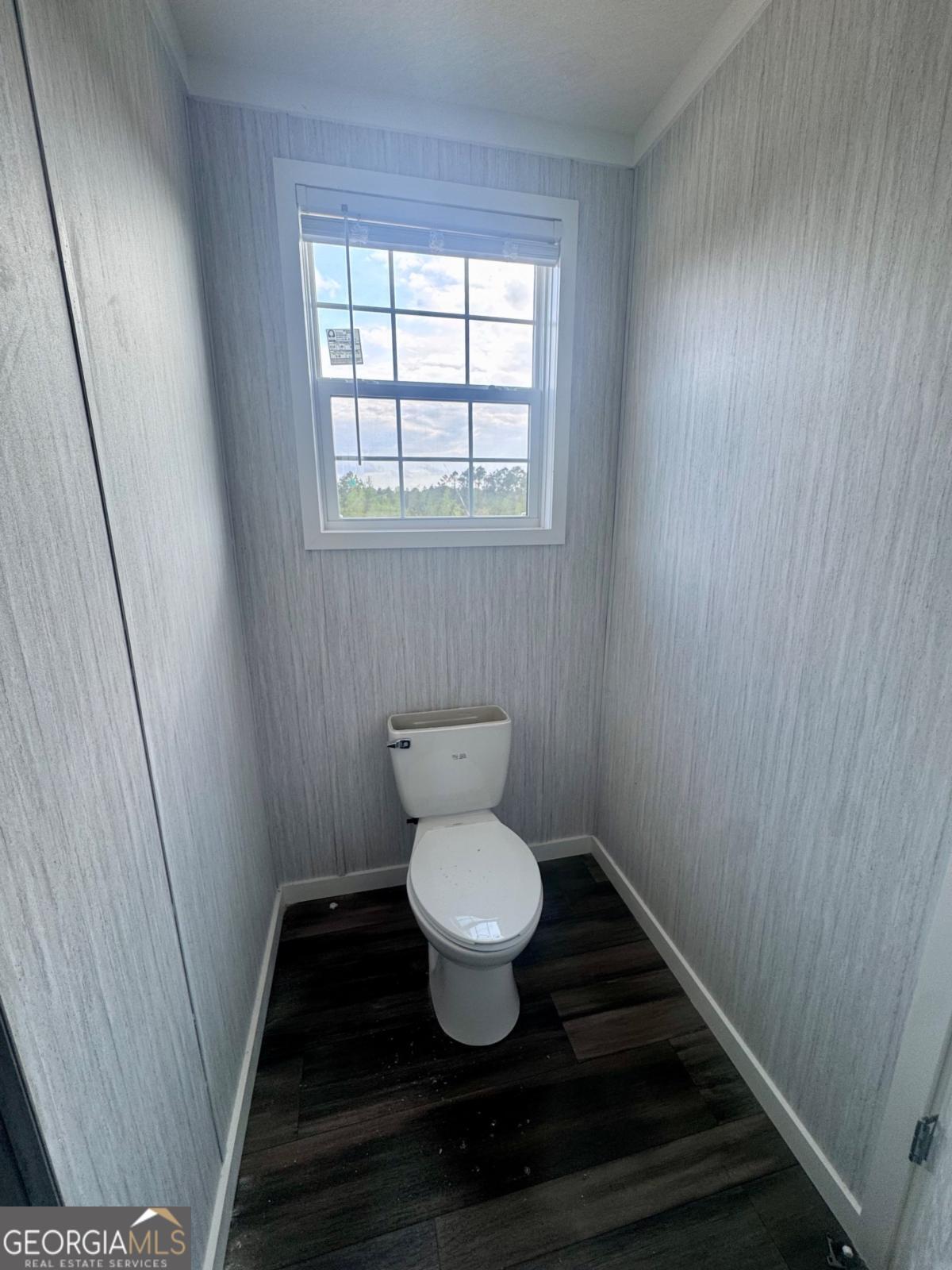 59 Long Leaf Road Hazlehurst, GA 31539 - Photo 15 of 19 a bathroom with a toilet