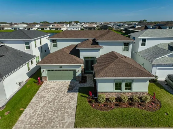 $889,900 | 8462 Ivy Stark Boulevard, Wesley Chapel, FL 33545