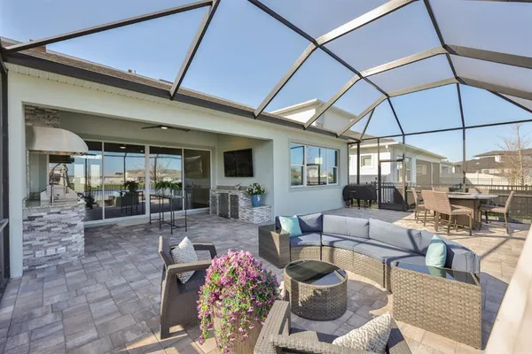 $889,900 | 8462 Ivy Stark Boulevard, Wesley Chapel, FL 33545