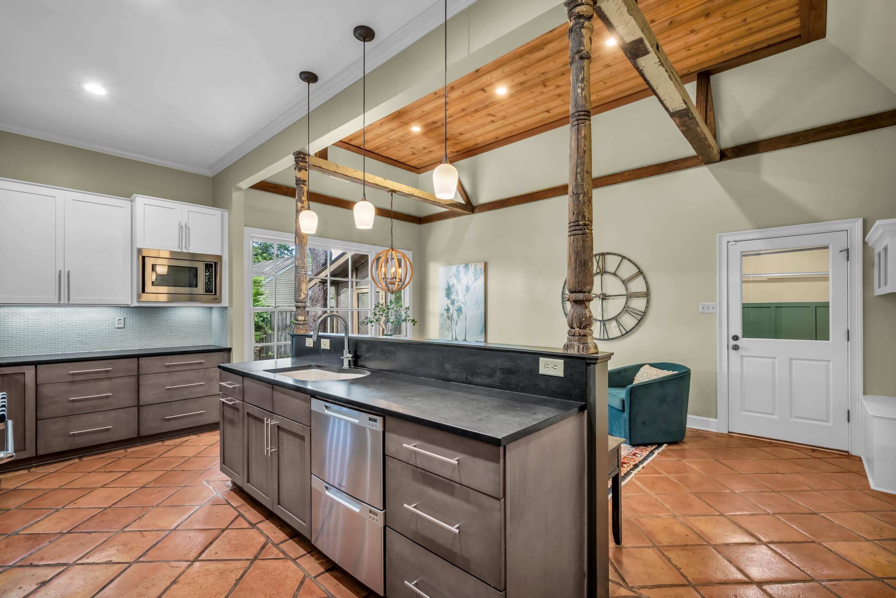 99 Red Acres Place Memphis, TN 38111 - Photo 11 of 39 a kitchen with stainless steel appliances granite countertop a sink and cabinets
