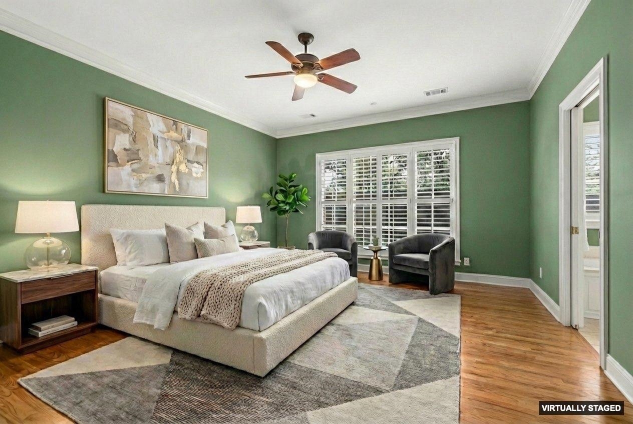 99 Red Acres Place Memphis, TN 38111 - Photo 14 of 39 a bedroom with a large bed and a window