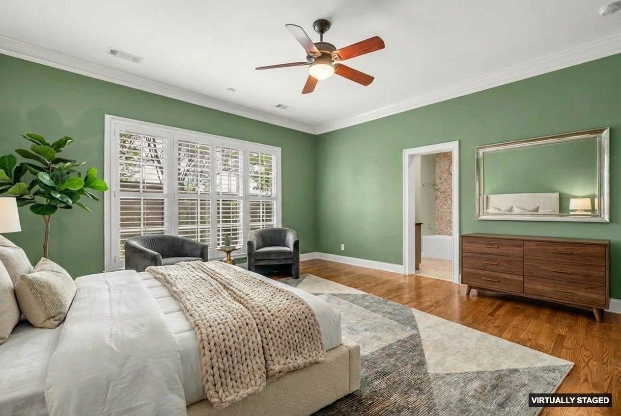 99 Red Acres Place Memphis, TN 38111 - Photo 15 of 39 a bedroom with a large bed and a dresser