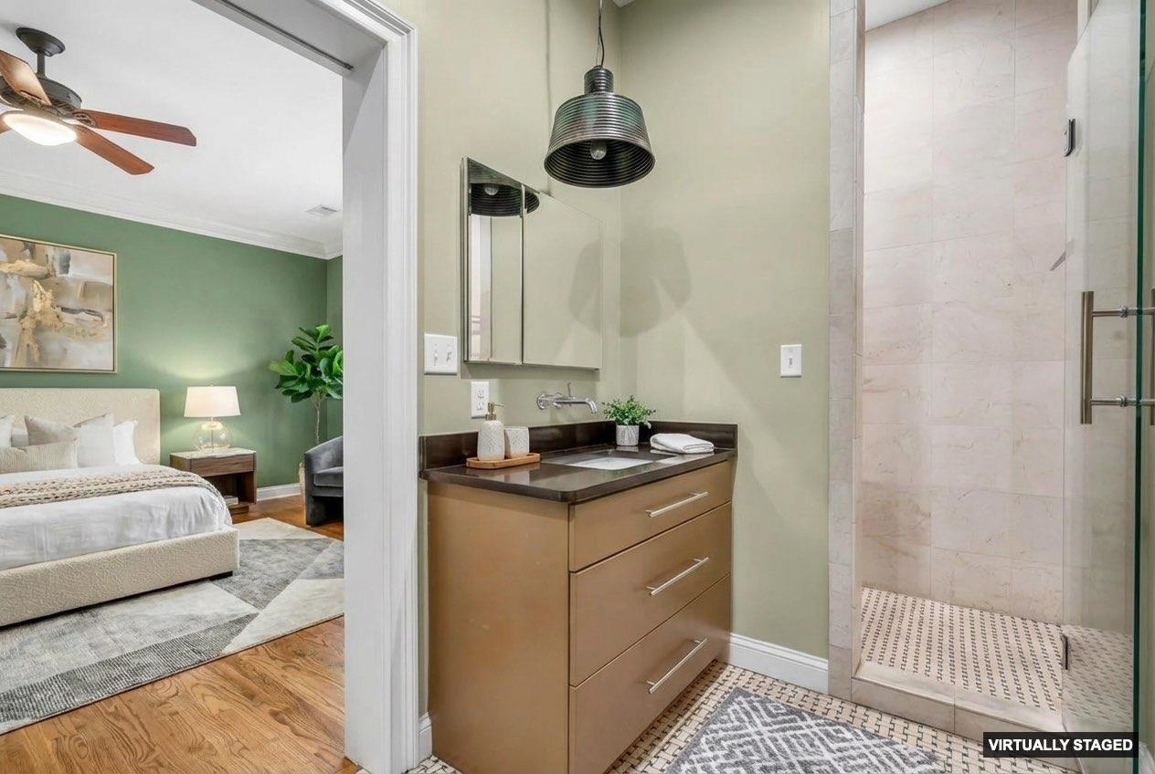 99 Red Acres Place Memphis, TN 38111 - Photo 16 of 39 a kitchen with stainless steel appliances granite countertop a sink a stove and a refrigerator