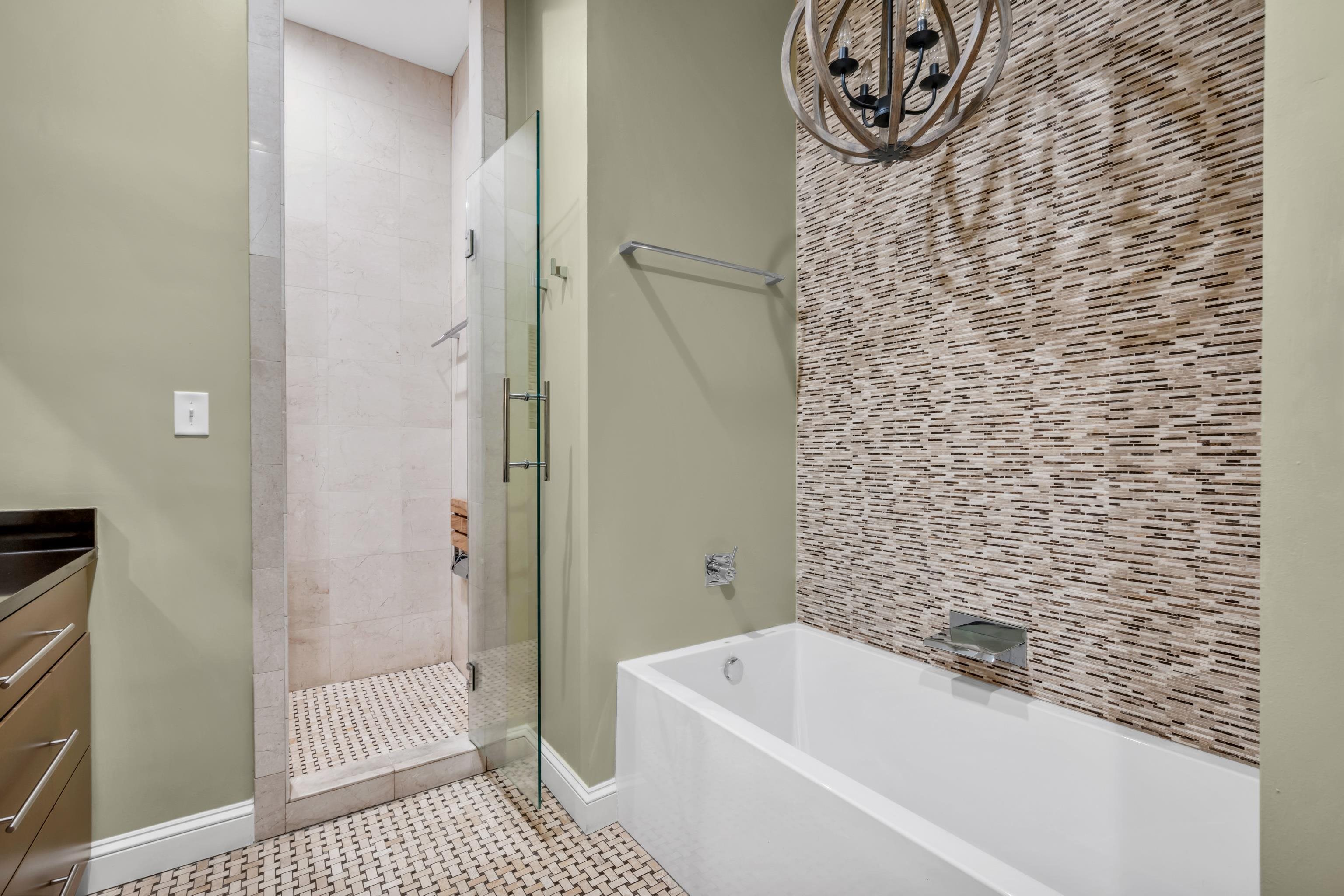 99 Red Acres Place Memphis, TN 38111 - Photo 18 of 39 a bathroom with a bathtub and shower