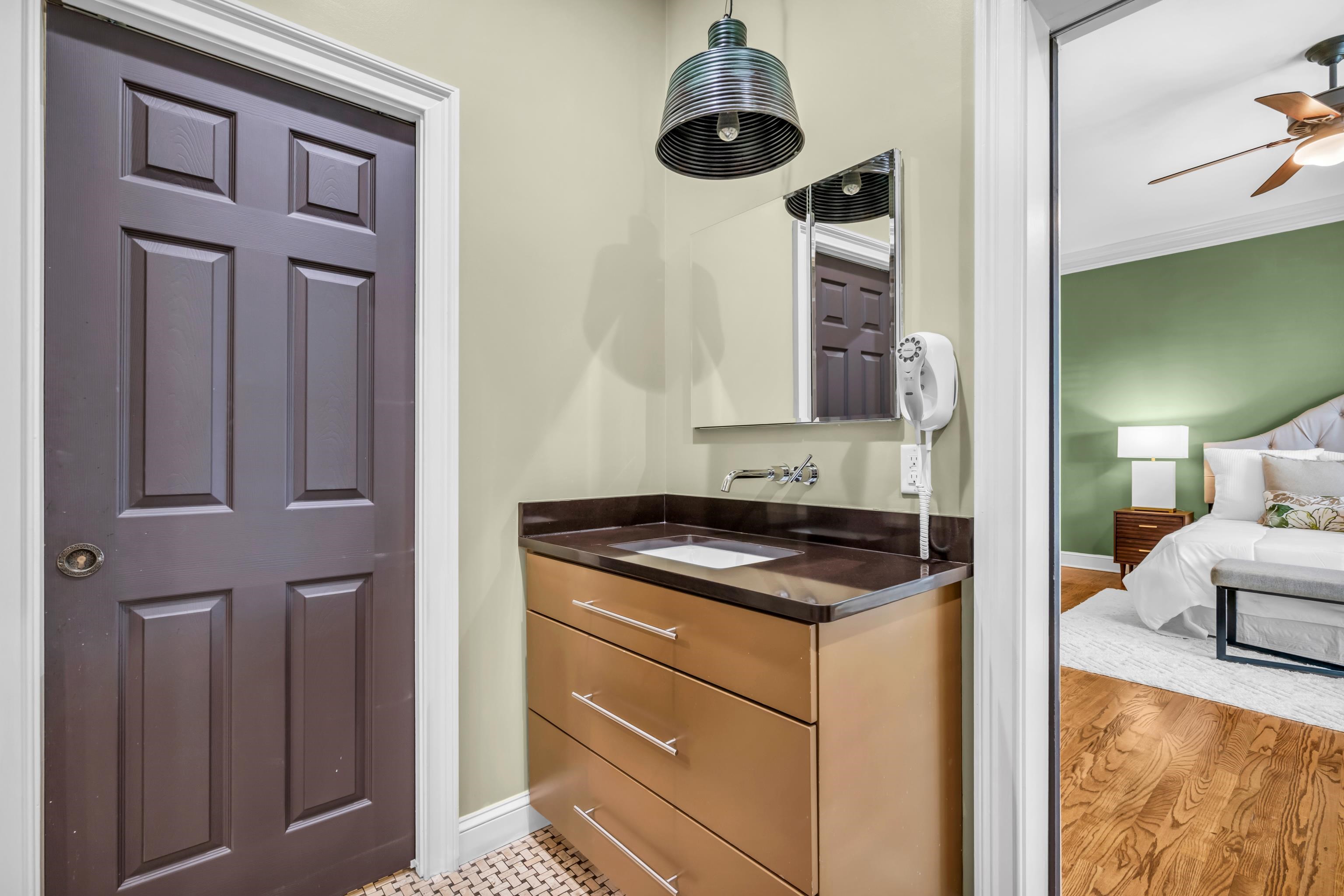 99 Red Acres Place Memphis, TN 38111 - Photo 19 of 39 a view of kitchen island with cabinets and wooden floor