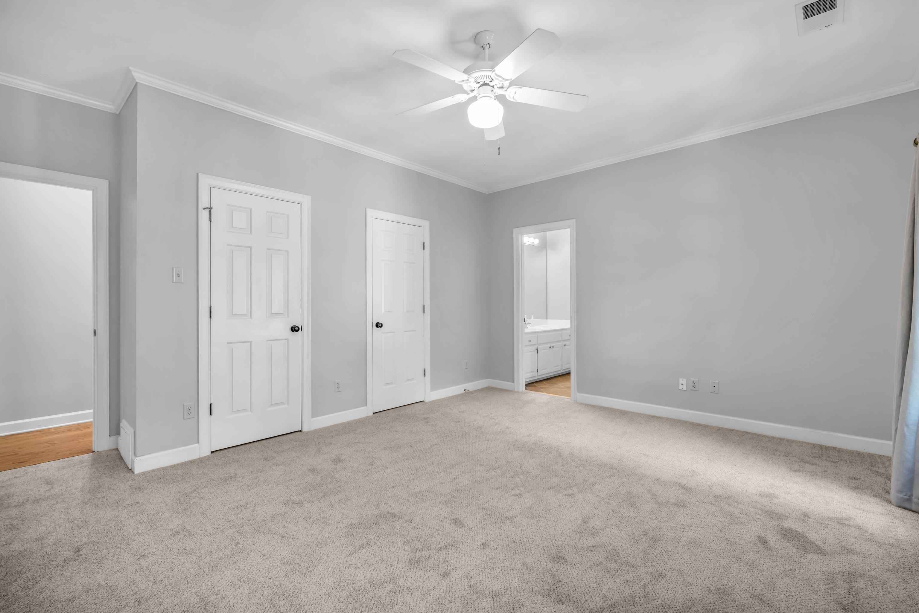 99 Red Acres Place Memphis, TN 38111 - Photo 26 of 39 a view of an empty room with a ceiling fan