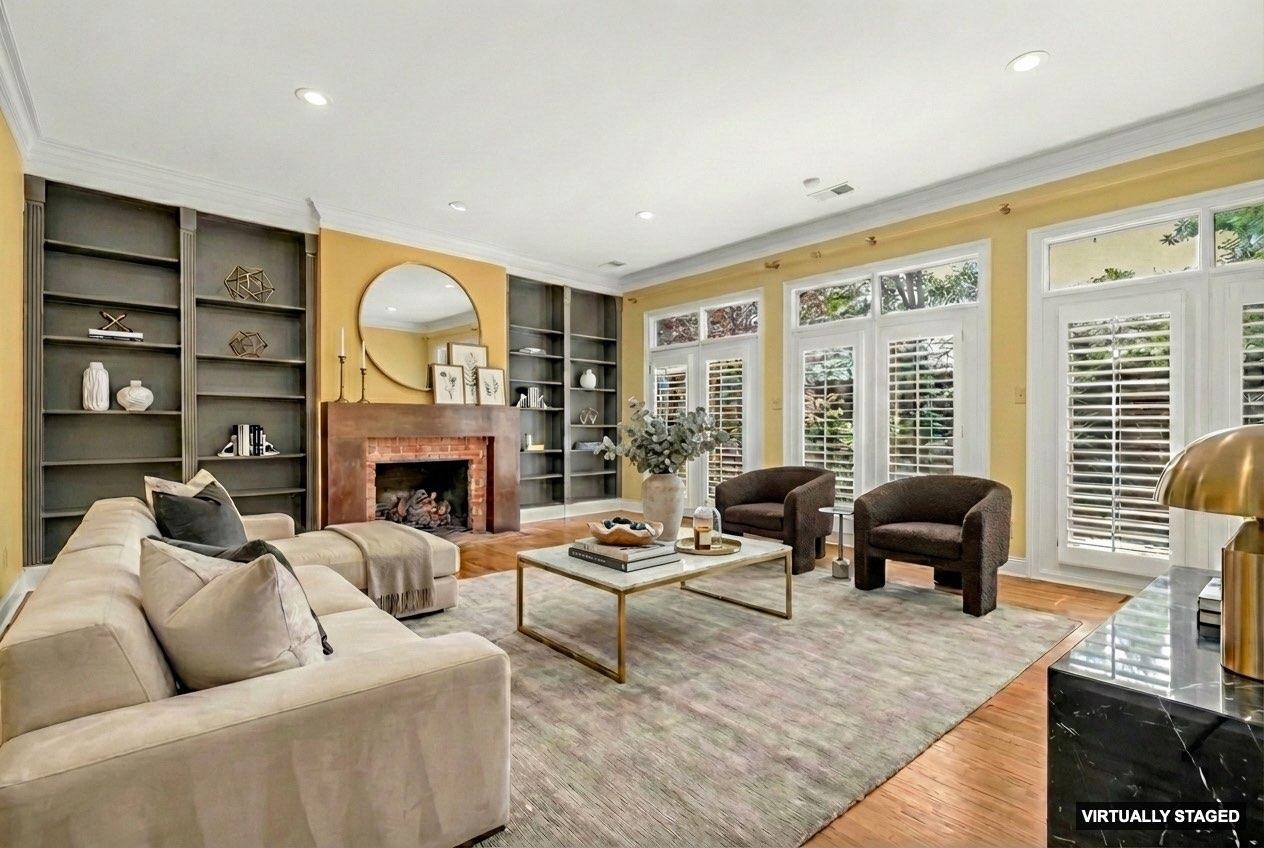 99 Red Acres Place Memphis, TN 38111 - Photo 3 of 39 a living room with furniture fireplace and a large window