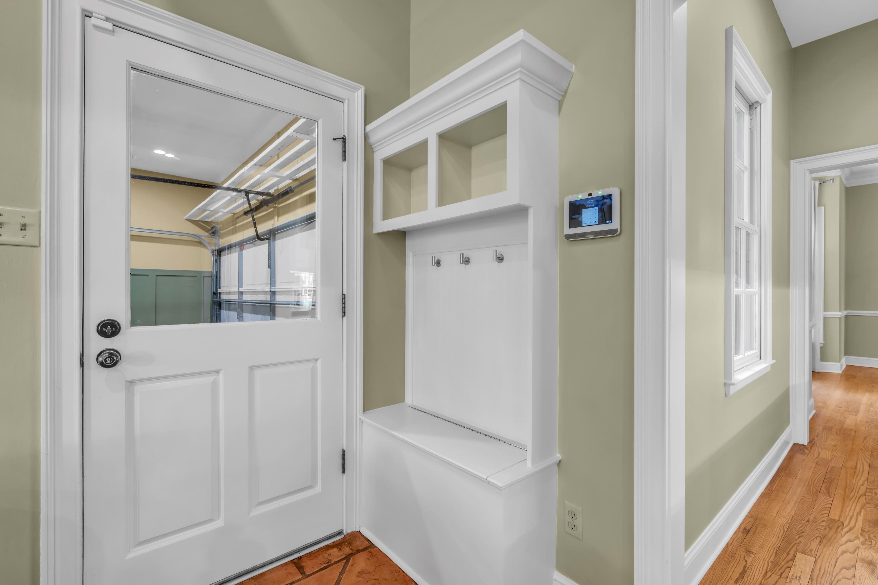 99 Red Acres Place Memphis, TN 38111 - Photo 31 of 39 a view of a hallway with entryway and wooden floor