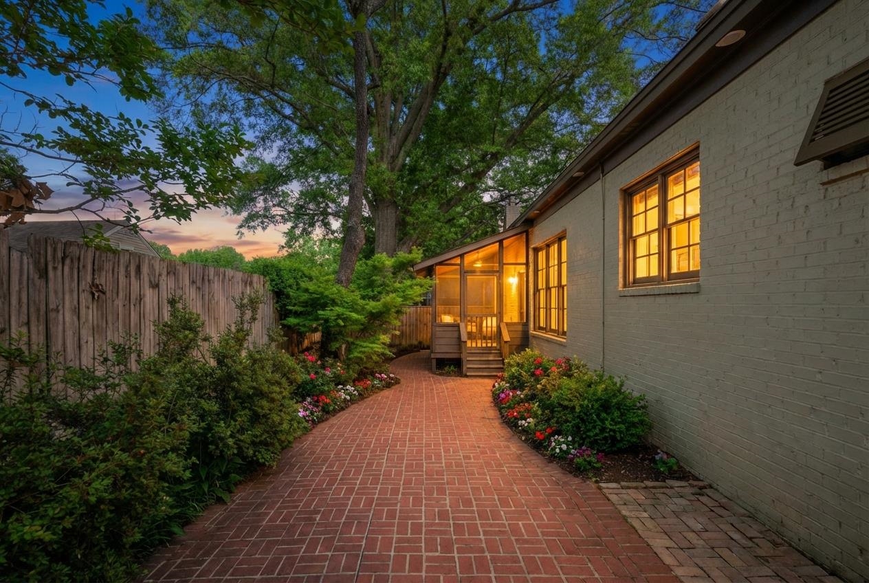 99 Red Acres Place Memphis, TN 38111 - Photo 33 of 39 a view of a house with potted plants and large trees