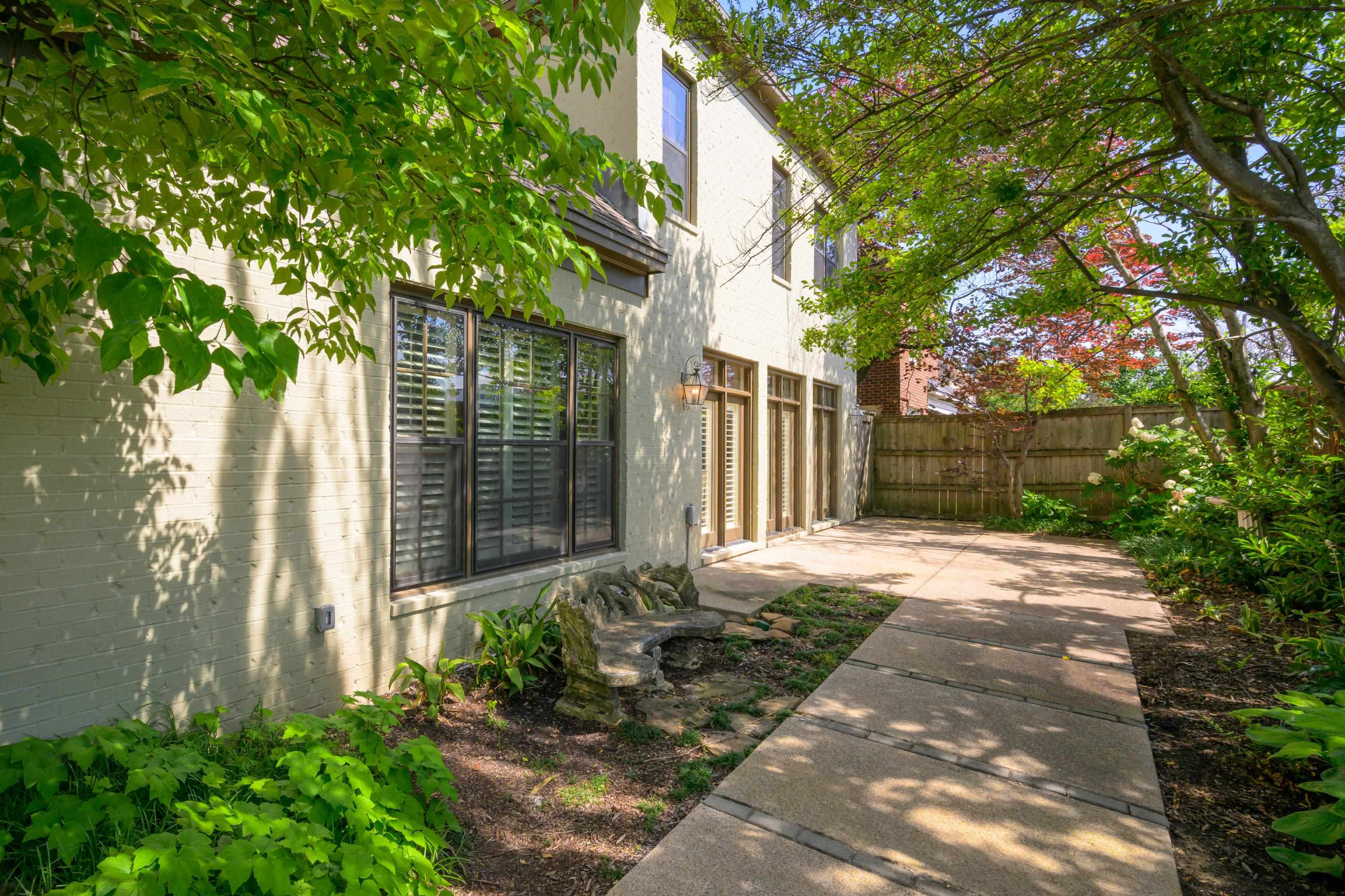 99 Red Acres Place Memphis, TN 38111 - Photo 35 of 39 a backyard of a house with lots of green space