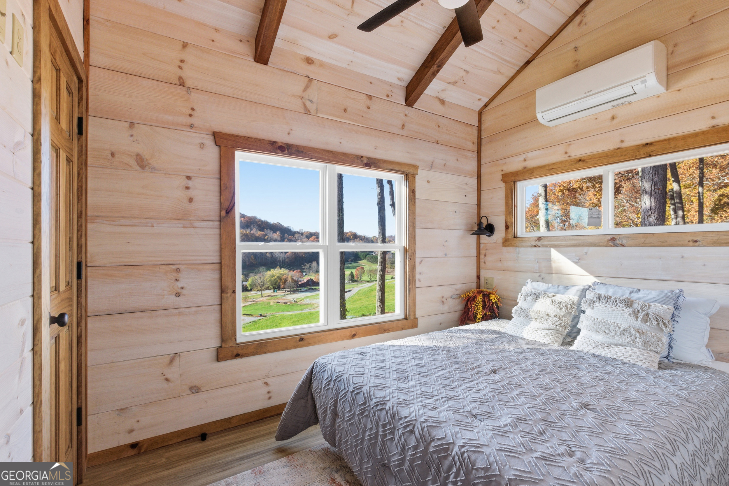 527 Saunders Road Franklin, NC 28734 - Photo 17 of 19 a bedroom with a bed and a window