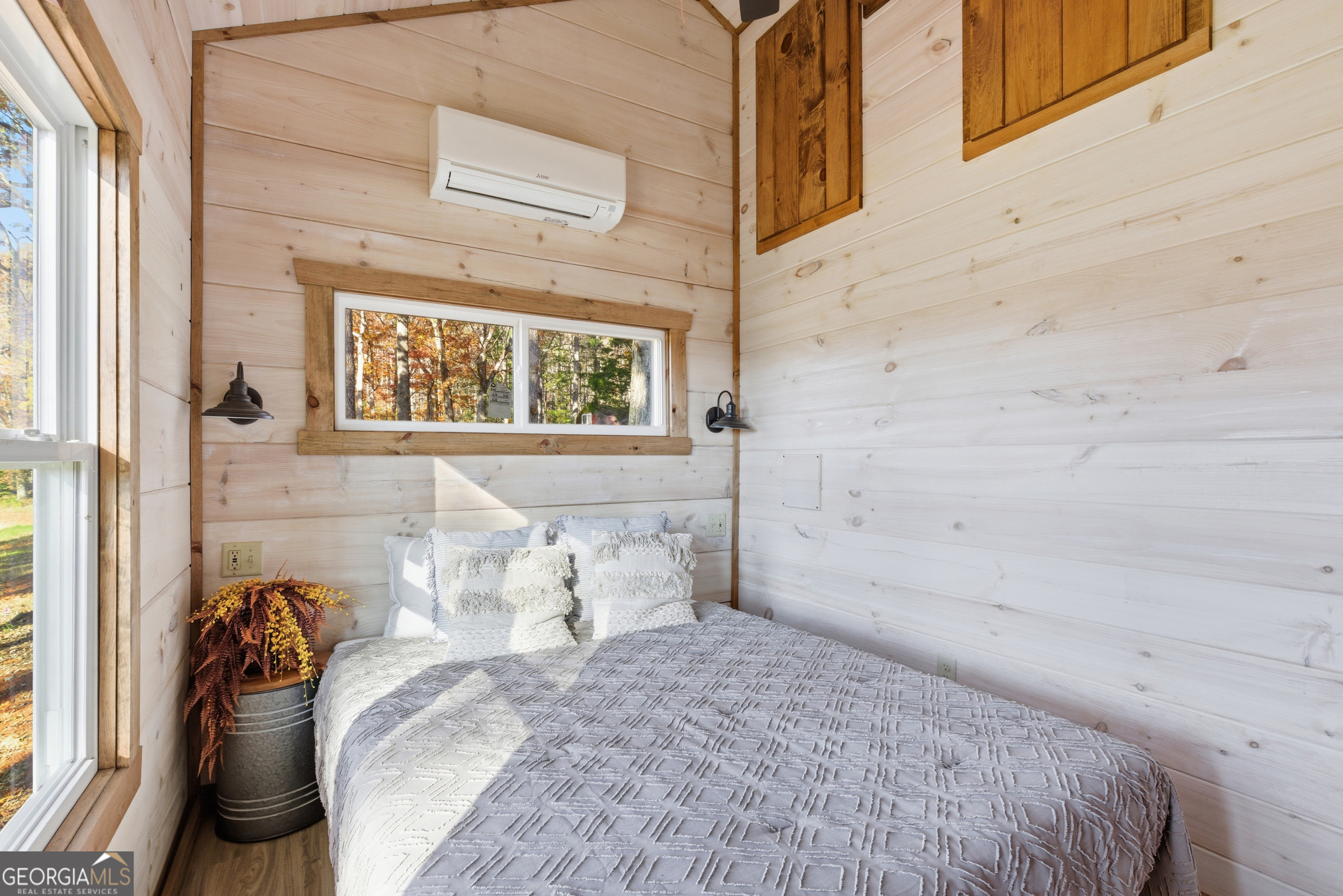 527 Saunders Road Franklin, NC 28734 - Photo 18 of 19 a bedroom with a bed and a window