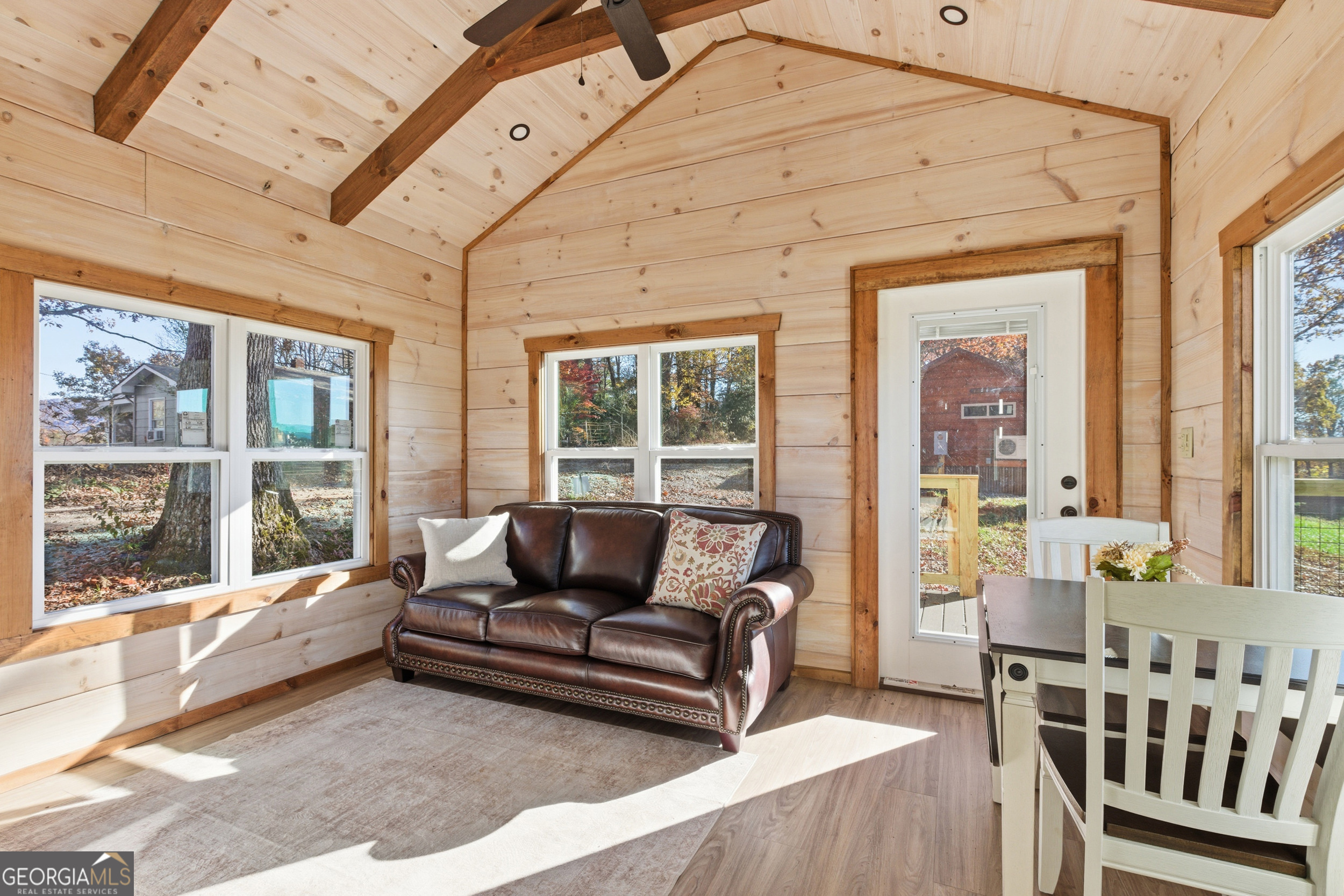 527 Saunders Road Franklin, NC 28734 - Photo 8 of 19 a living room with furniture and large windows