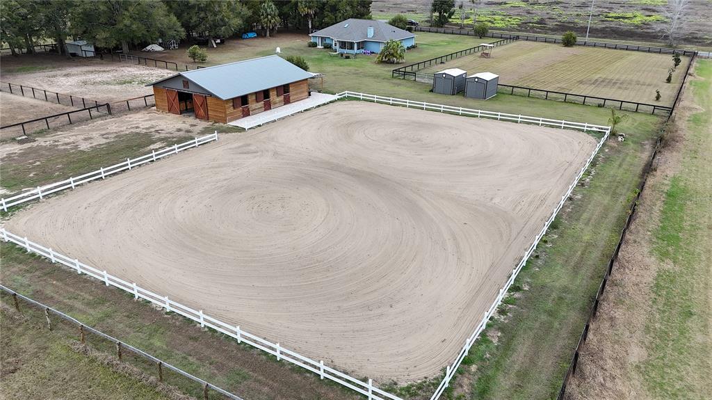 20462 Southwest 36th Street Dunnellon, FL 34431 - Photo 54 of 55 a aerial view of a house with a yard and potted plants
