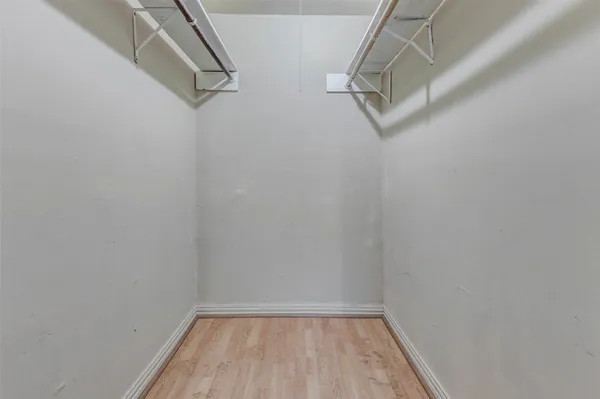 a view of a room with racks on the wall