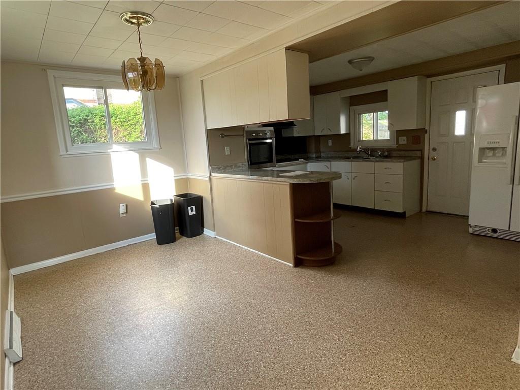 957 4th Avenue Freedom, PA 15042 - Photo 7 of 20 a kitchen with a sink cabinets and window